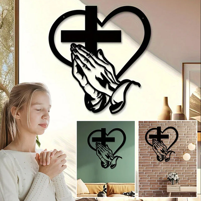 Praying hands  and metal cross